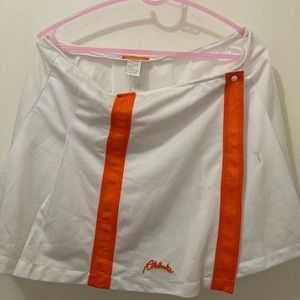 Pleated white and orange skirt